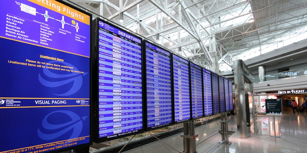 Flight time displays at Denver International Airport in Denver, Colorado