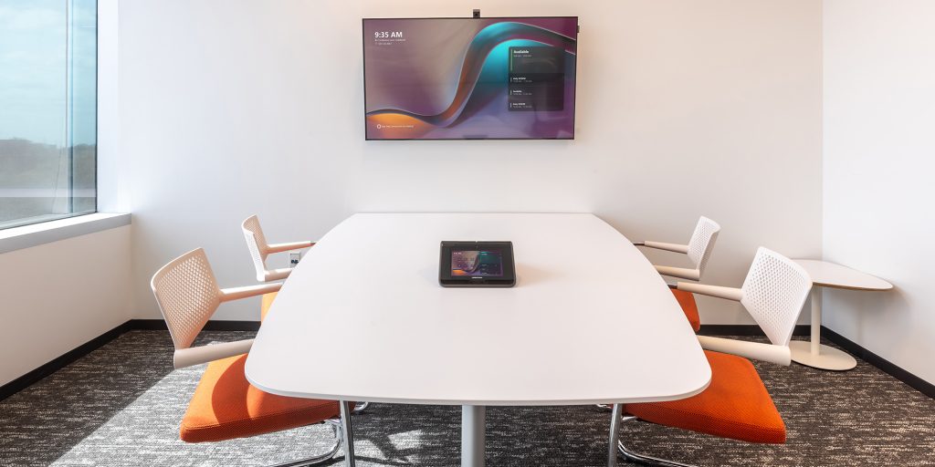 Enterprise retail AV installation in Mattress Firm headquarters with standardized Microsoft Teams Rooms conference systems