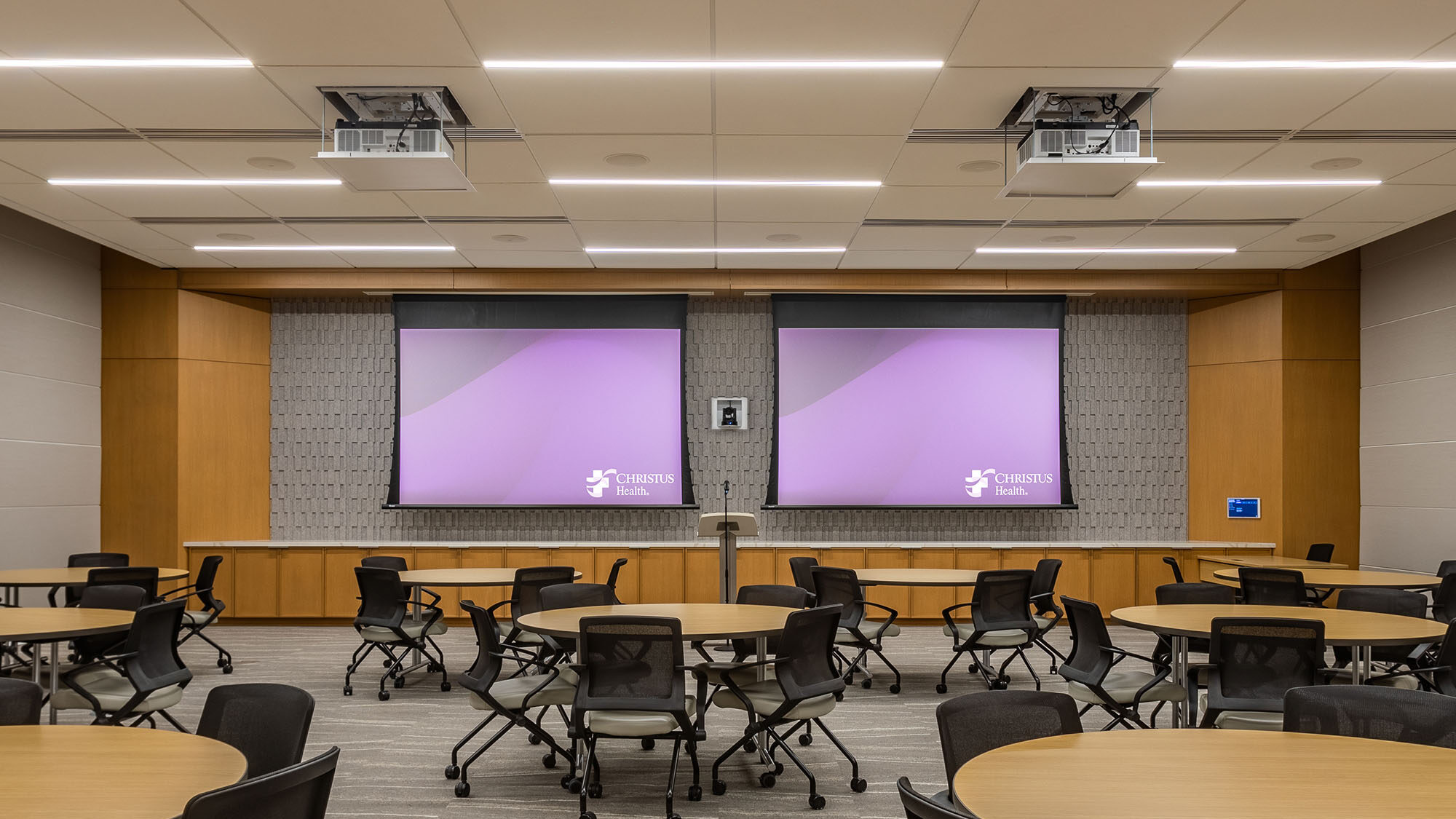 Two-123” projection screens and projectors along with 4K displays adorn the Chapel and Heritage Center while a large video wall consisting of four-55” displays and eight-65” 4K displays update the Security Operations Center