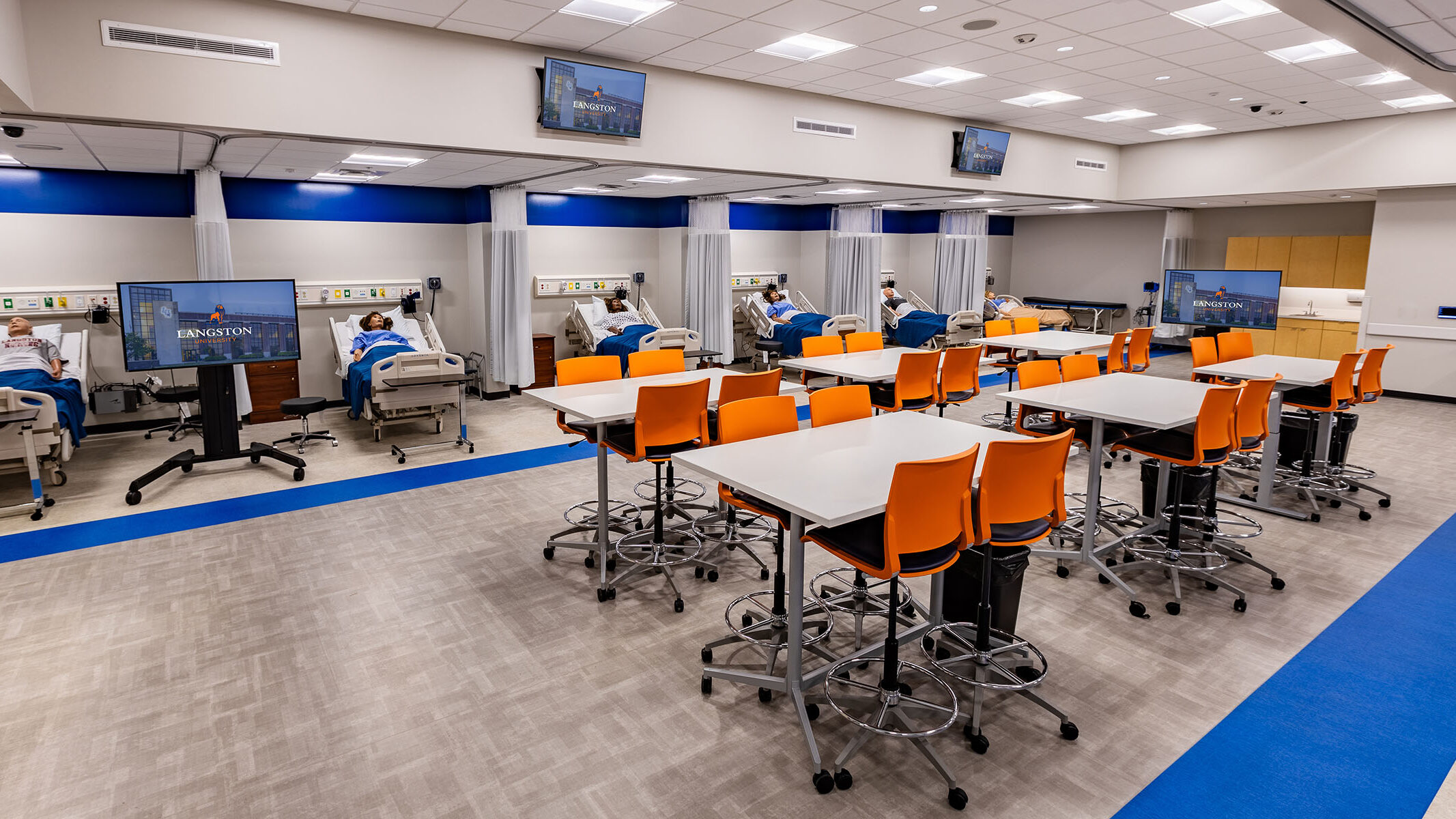 Simulation lab at Lanston University using advanced AV equipment for immersive healthcare education and training.