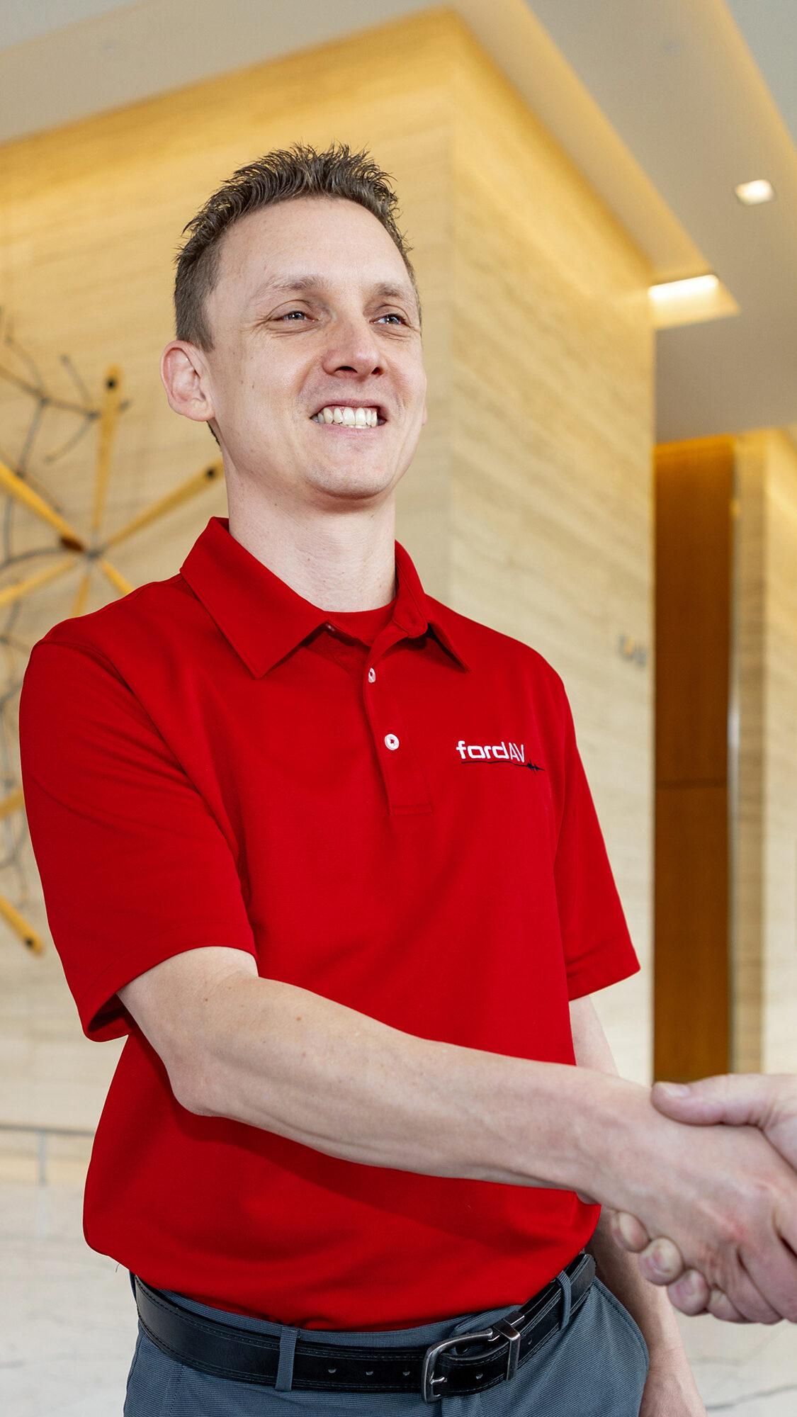 Ford AV employee completing a courtroom AV Integration Project