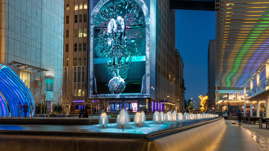 Aerial view of the Discovery District campus with modern buildings and green spaces