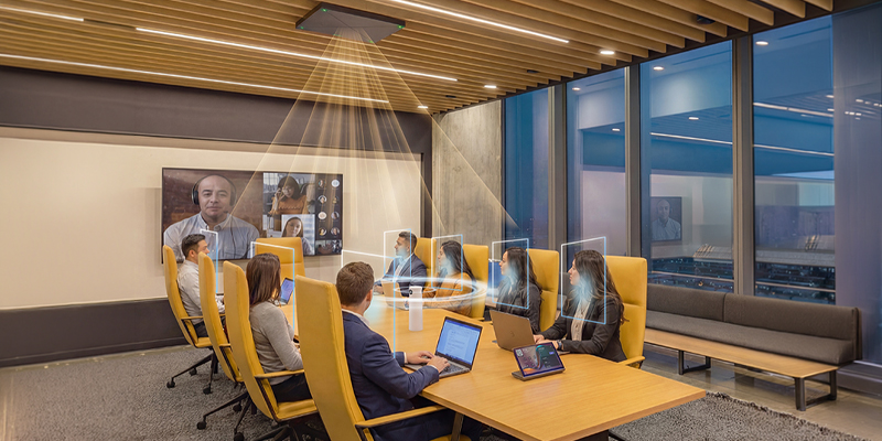 A 360-degree immersive AV conference camera placed in the center of a meeting table to intelligently frame active speakers.