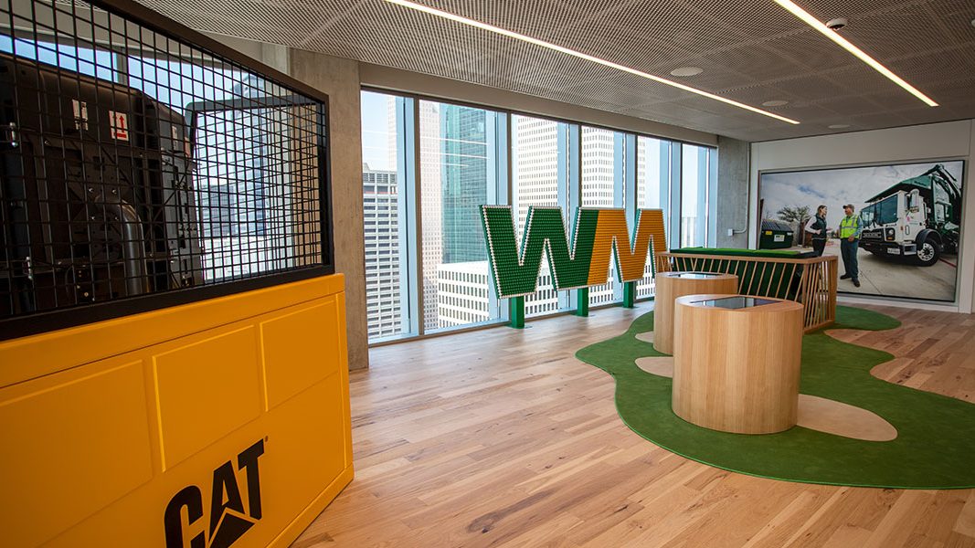 Waste Management corporate lobby AV installation with modern displays and lighting