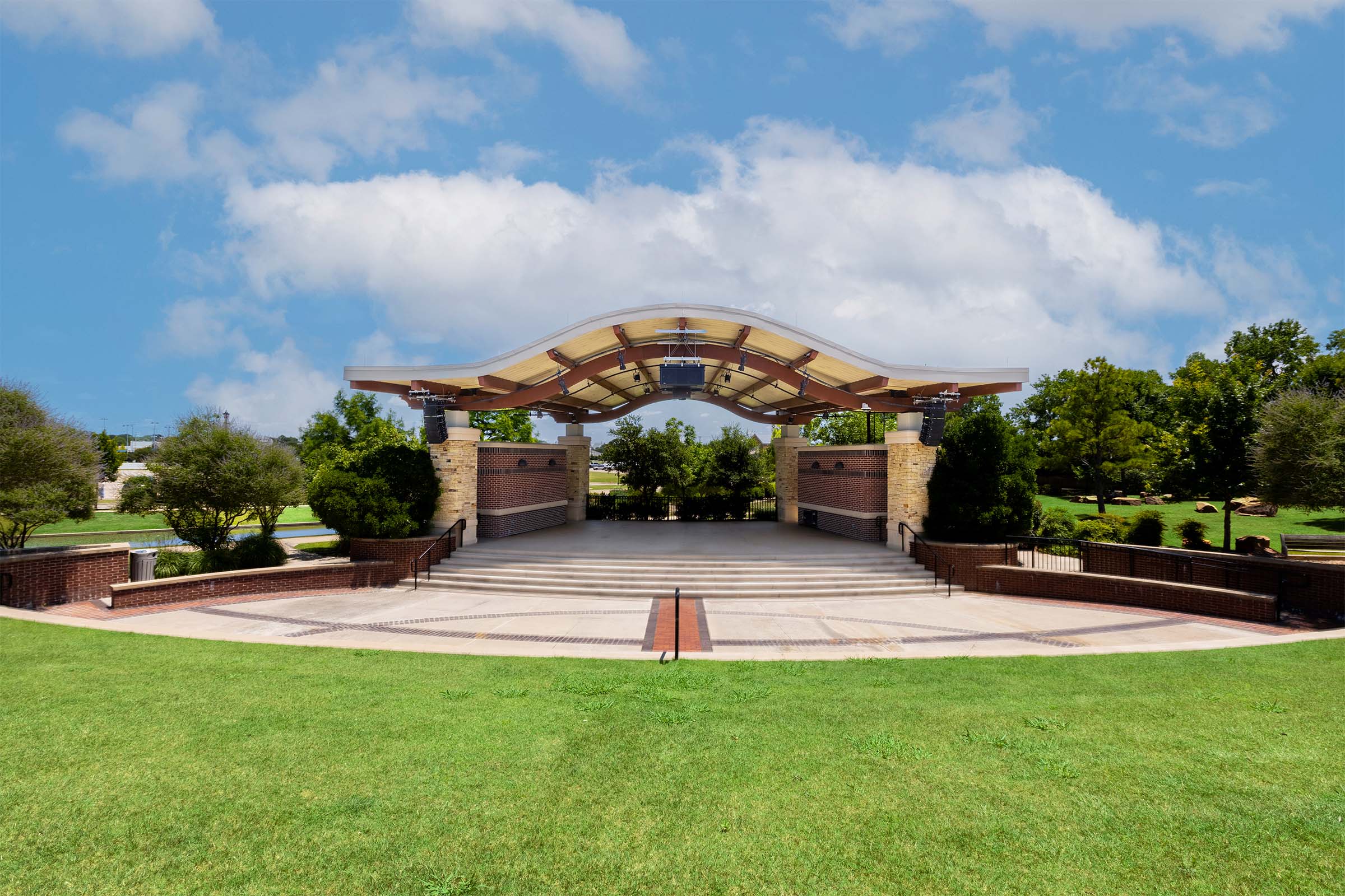 Outdoor amphitheatre AV system at City of Southlake Aria Amphitheatre featuring Meyer Sound line array speakers