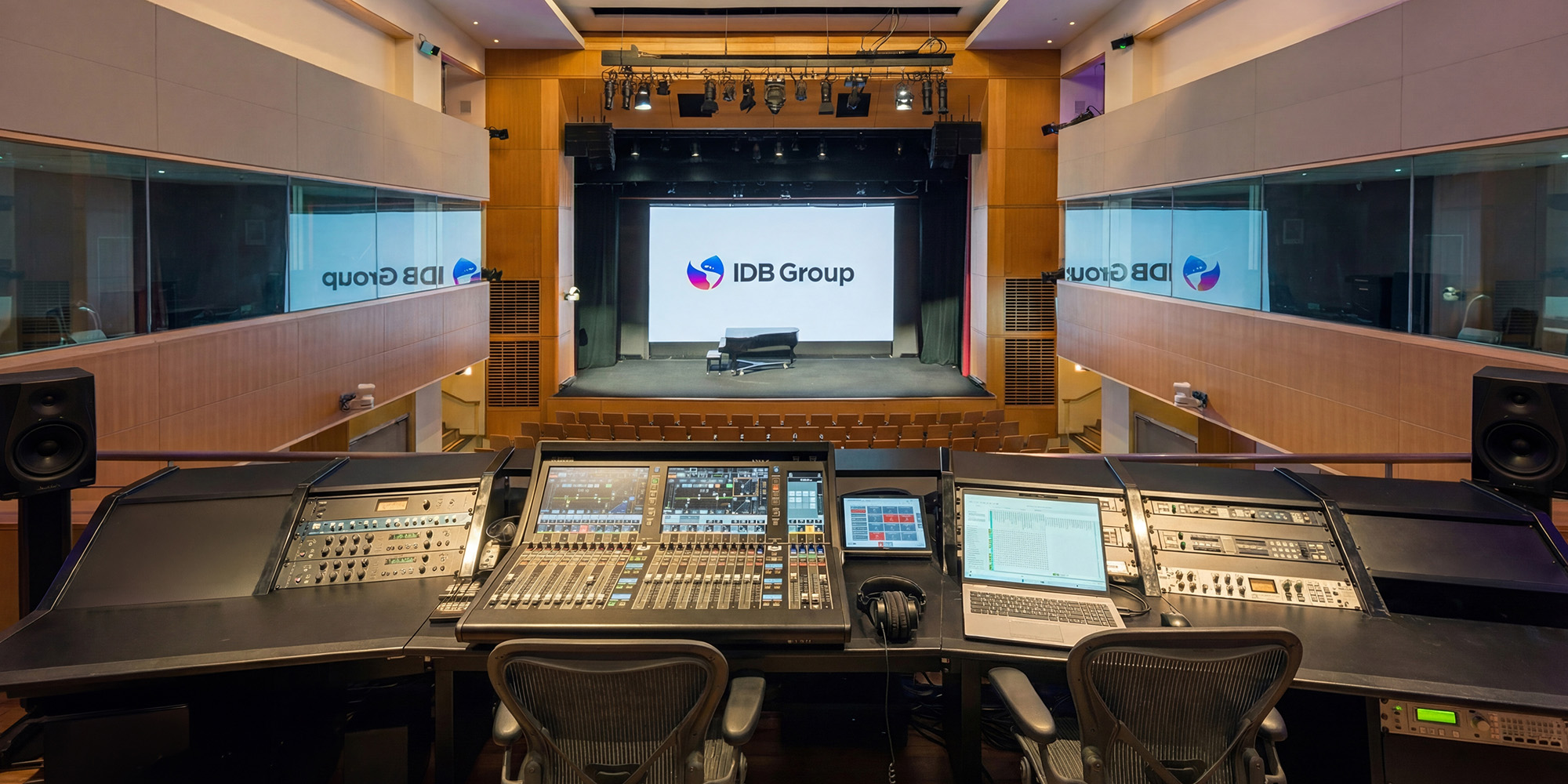 Enterprise conference center AV design featuring multilingual interpretation systems and broadcast-ready presentation technology.
