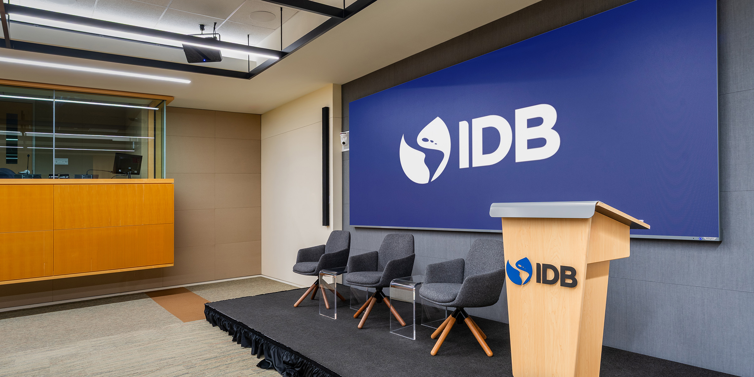 Modern conference center AV environment with large-format displays, live streaming infrastructure, and integrated room control systems.