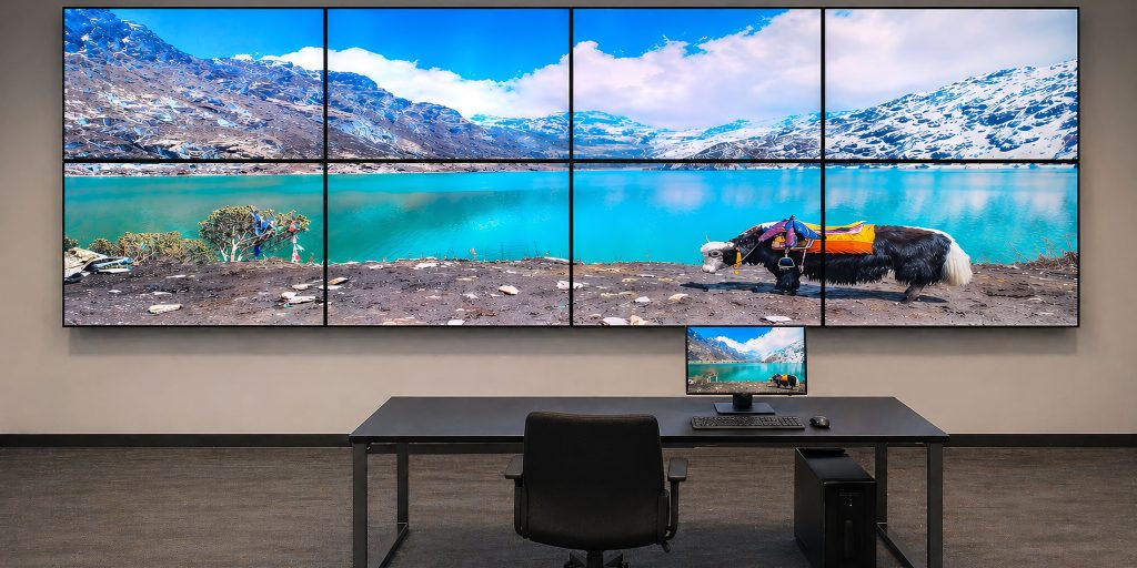 Hybrid collaboration room with enterprise AV technology supporting wireless device connectivity