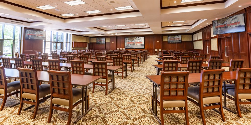 Corporate AV integration featuring a recessed direct-view LED video wall and Crestron control system