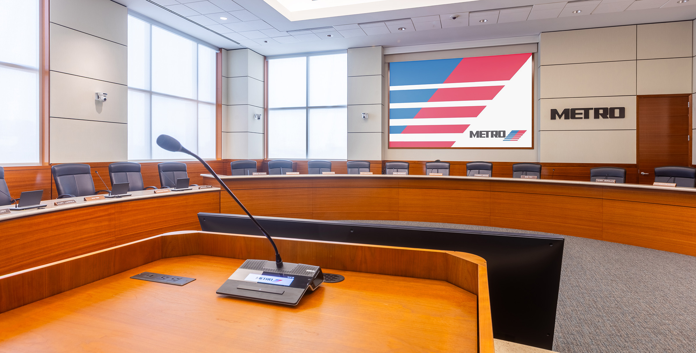 Houston METRO boardroom showcasing upgraded audiovisual technology, public seating, and presentation displays.