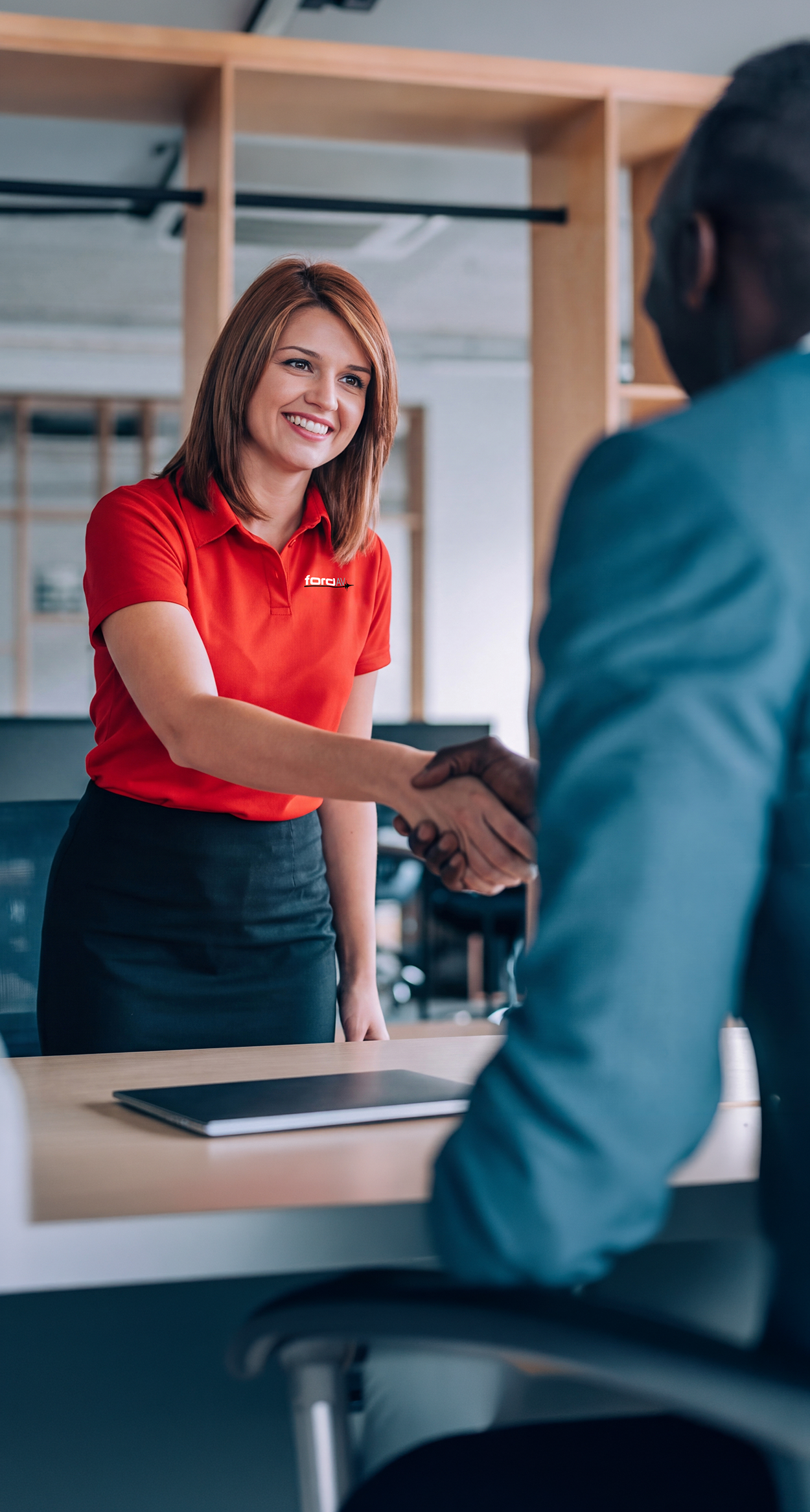 Ford AV Account Manager Shaking Hands with a customer